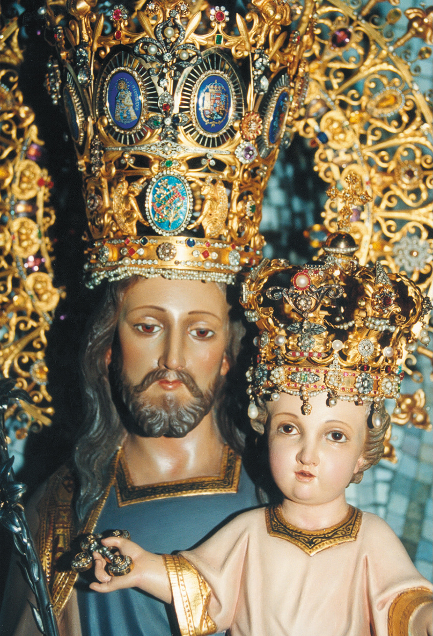 Solemnidad san josé de la montaña imagen en primer plano de la cara de San josé y el niño con la corona original.