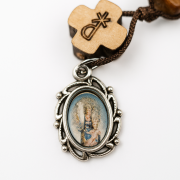 medalla de san jose de la montaña que cuelga de el rosario pulsera