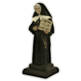 figura de madre petra sosteniendo un libro enel que se puede leer: vos sobre todas las cosas.
